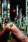 computer chip in hand with city lights