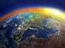 earth view of europe city lights with sun