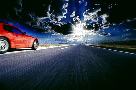 red car on road